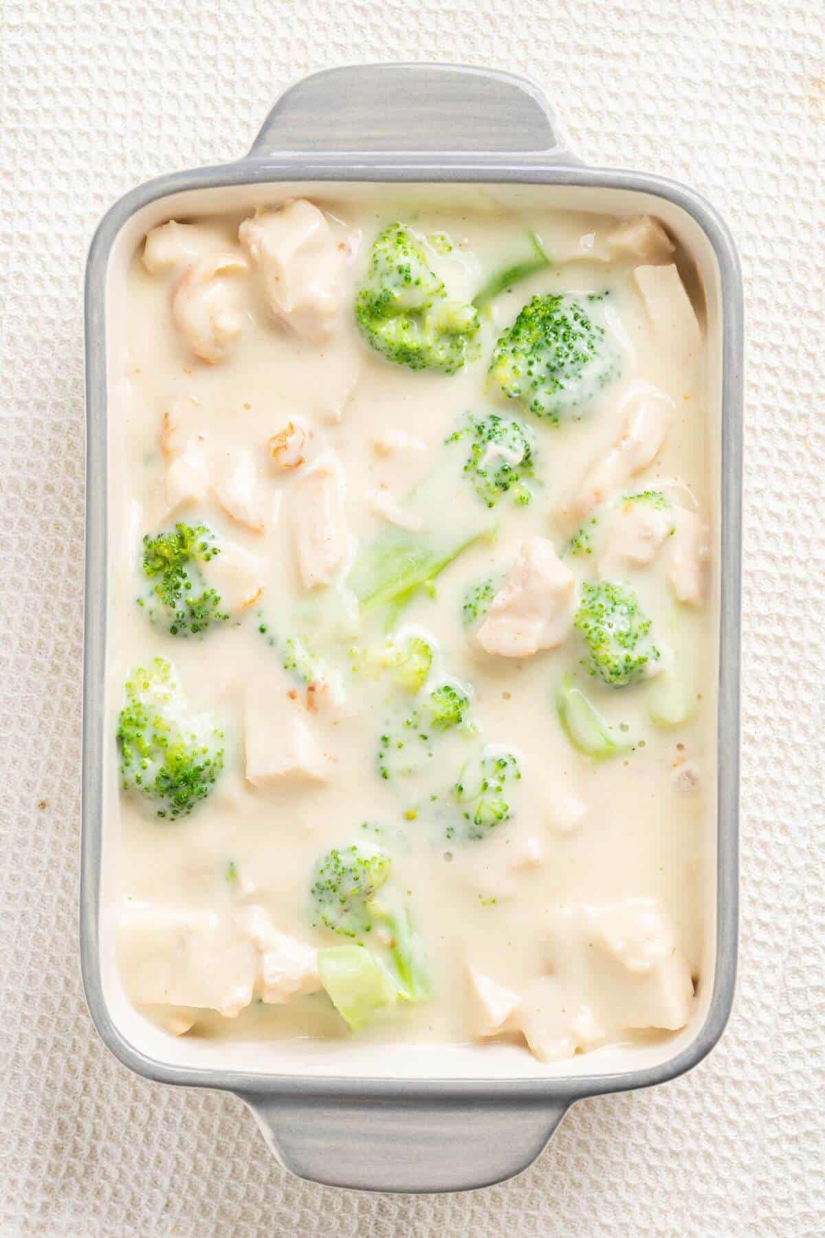 Chicken and broccoli mixture in casserole pan.
