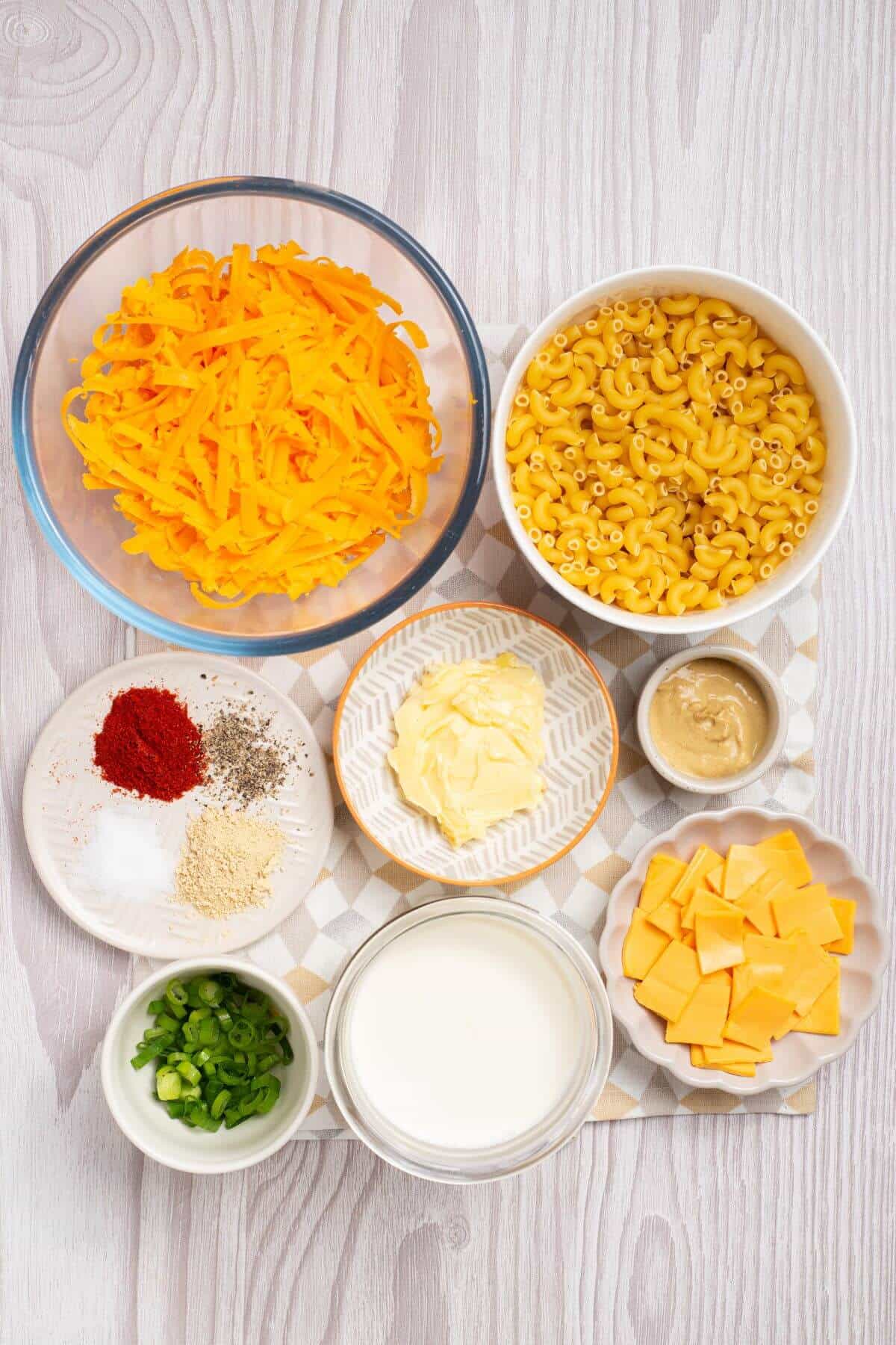 The ingredients for a macaroni and cheese recipe.