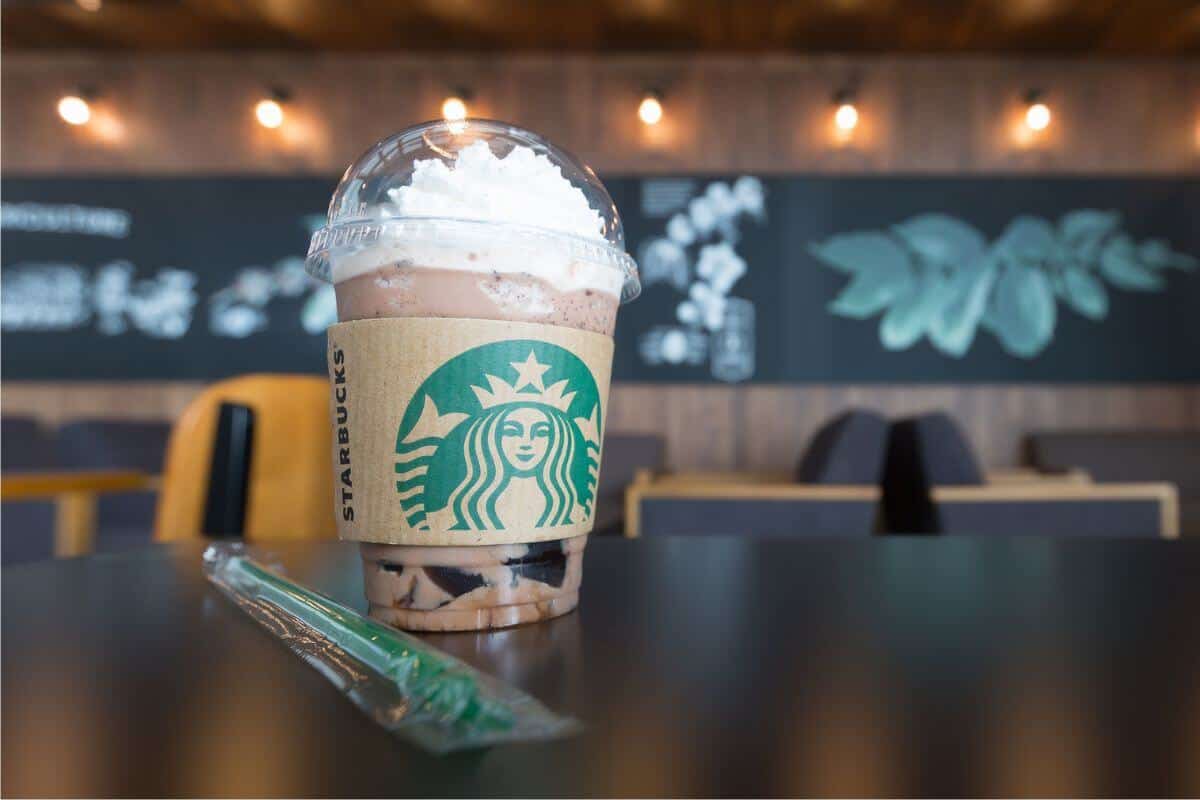 A secret menu Starbucks drink is sitting on top of a table.