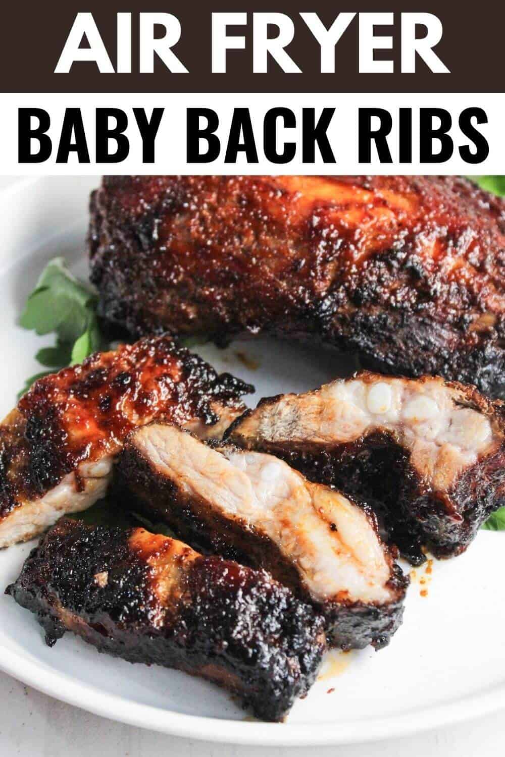 Air fryer baby back ribs on a plate.