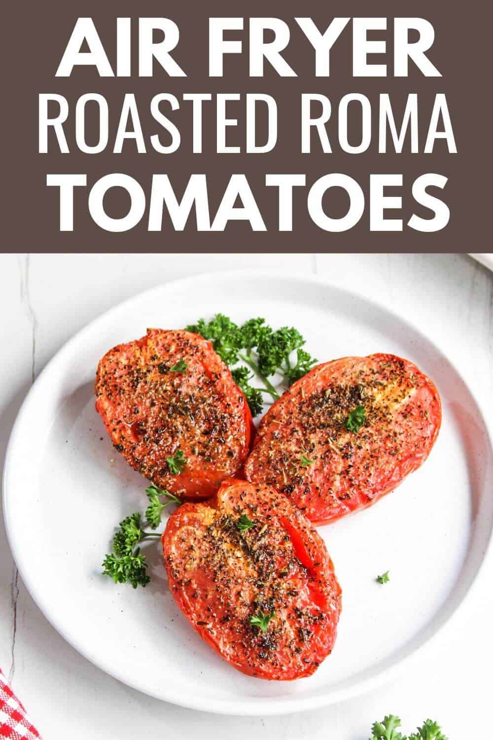 Air fryer roasted roma tomatoes on a plate.
