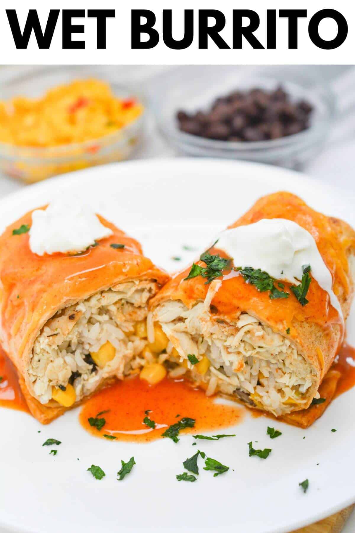 Wet burrito on a white plate.