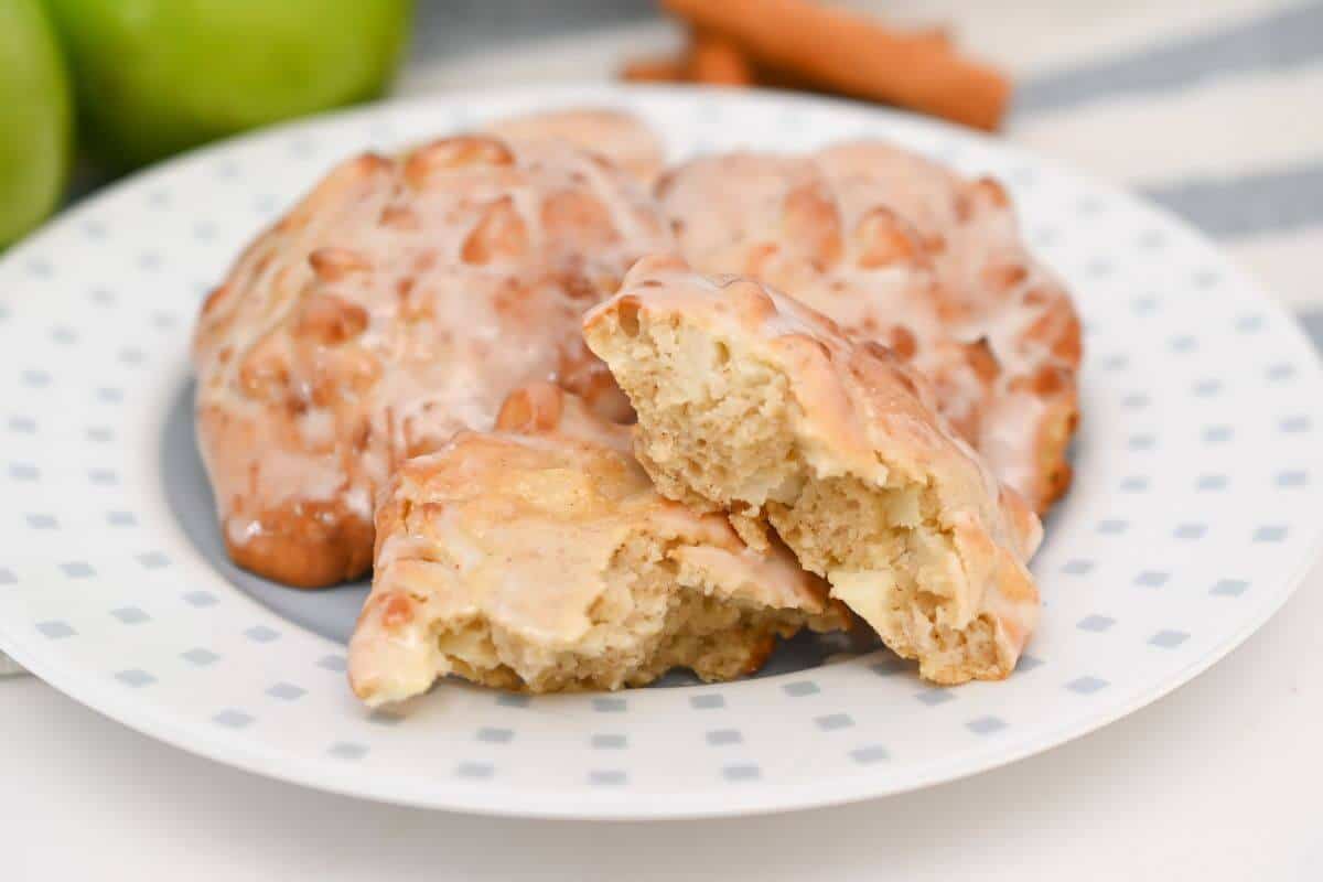 Apple cinnamon fritters on a plate.