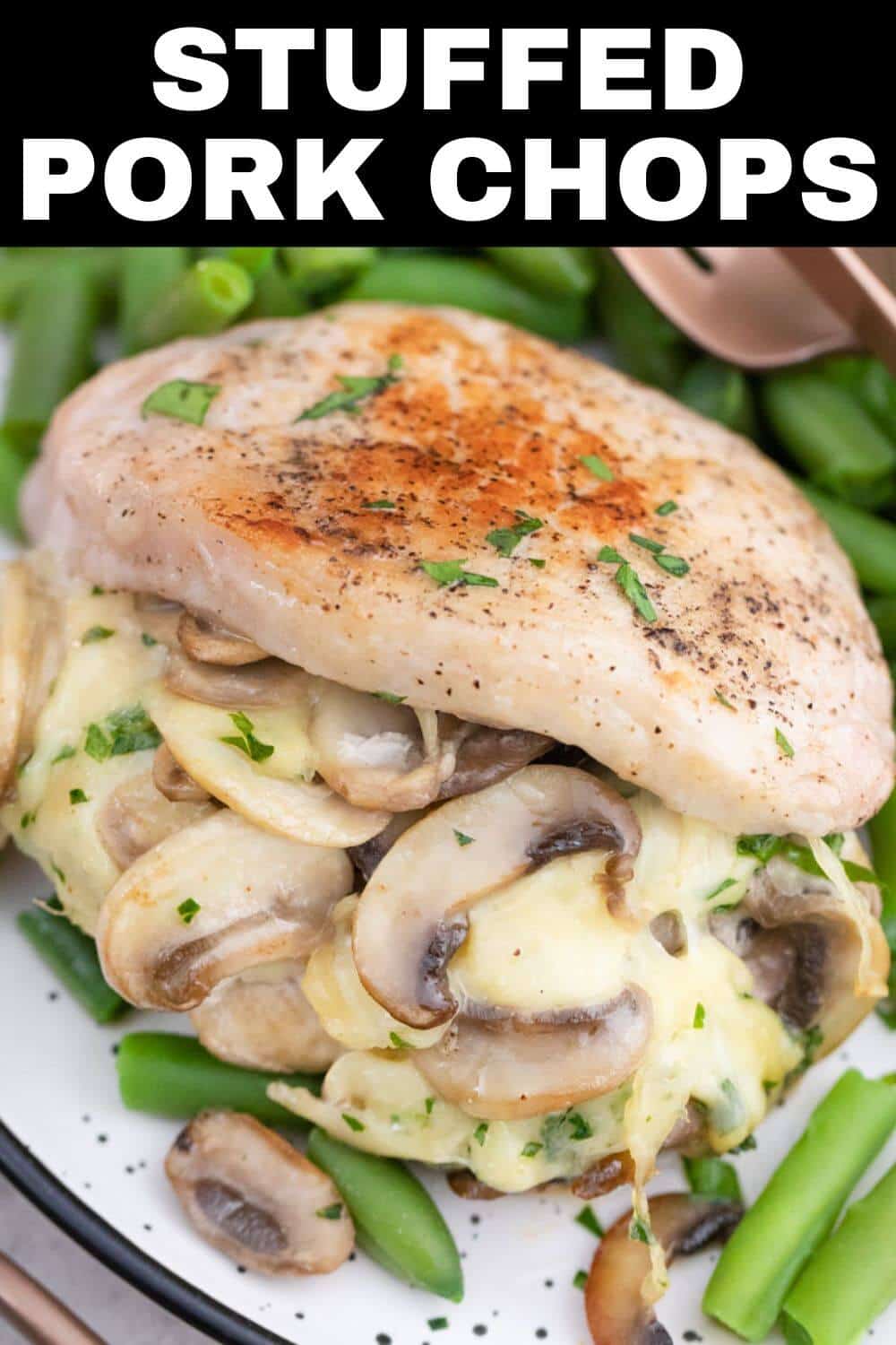 Stuffed pork chops with mushrooms and green beans.