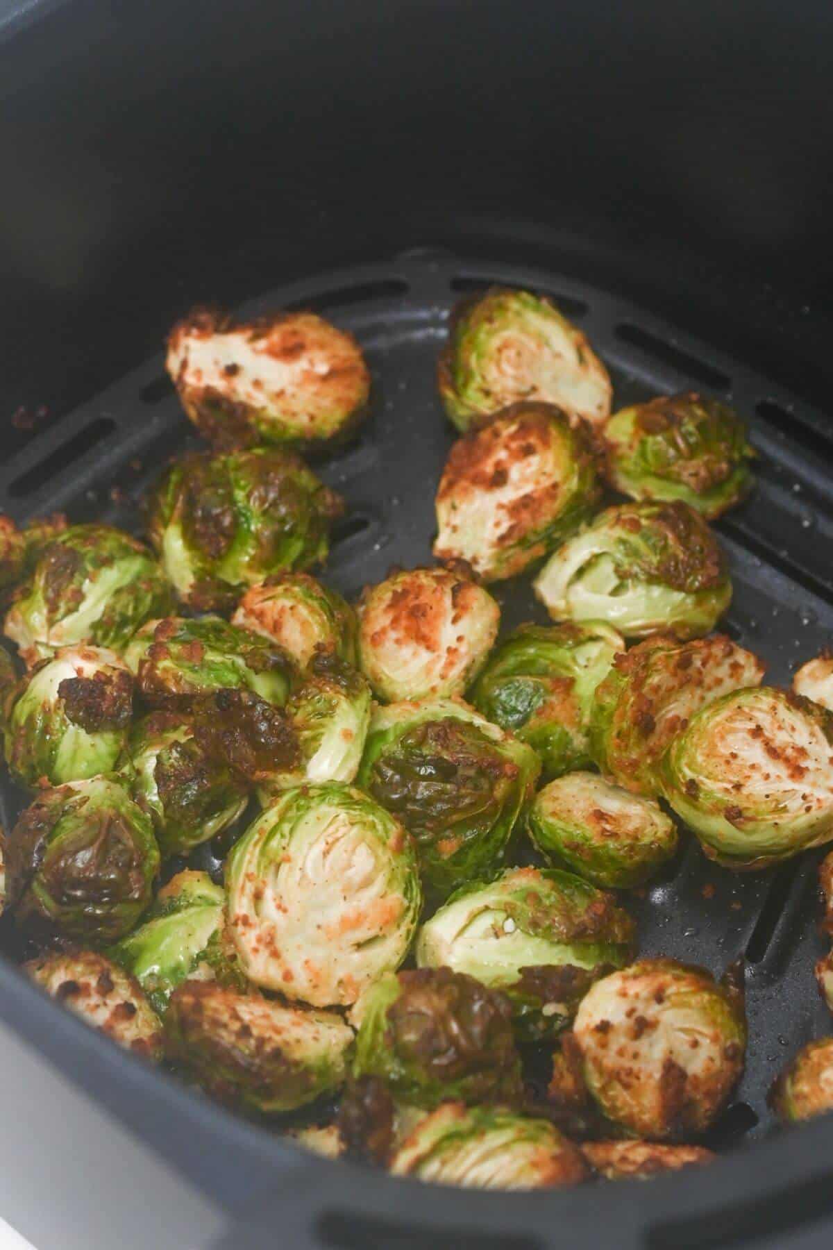 Roasted brussels sprouts in an air fryer.