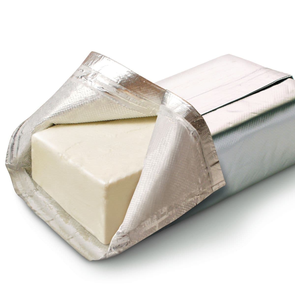 A piece of cream cheese wrapped in foil out to soften.