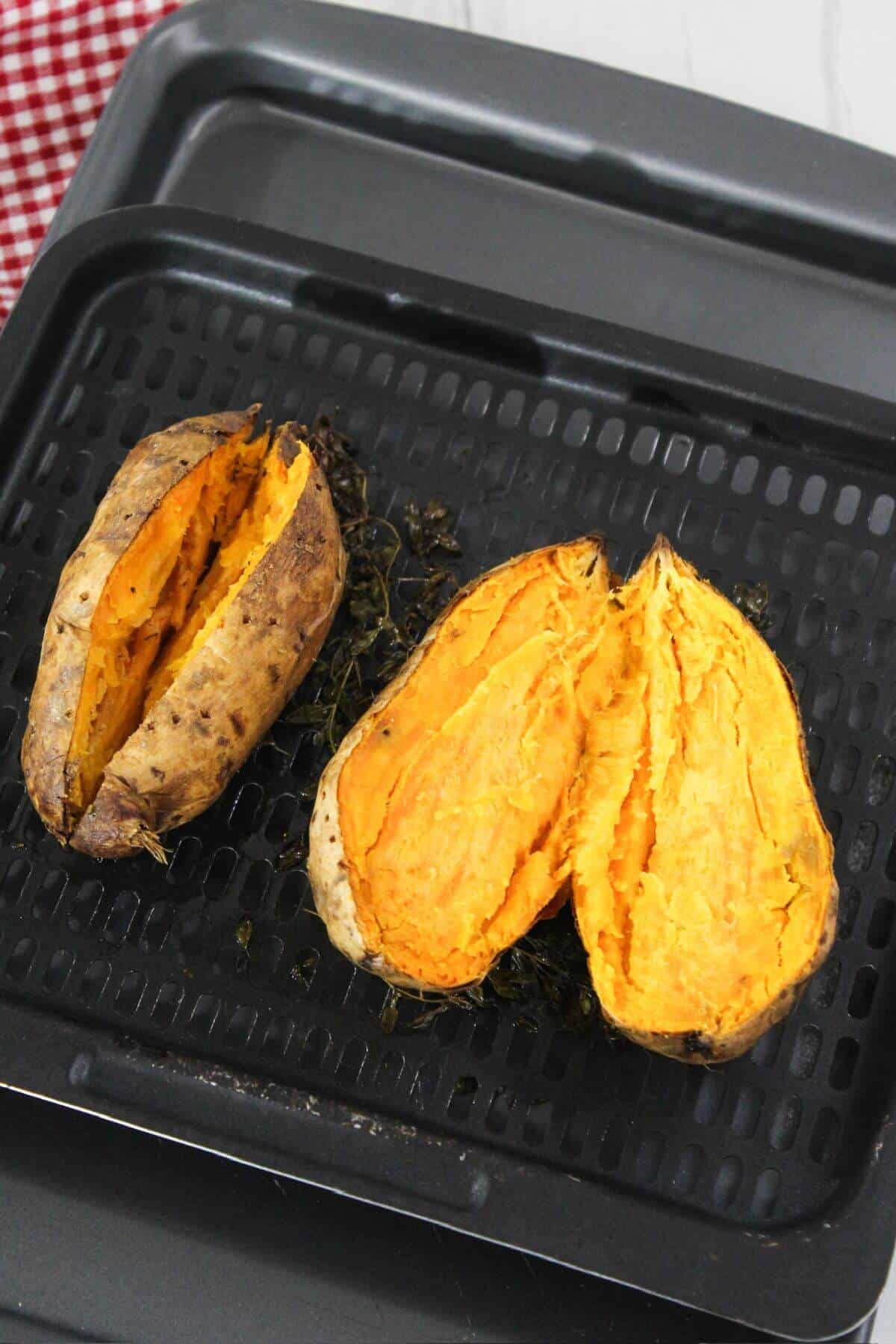 Sweet potatoes on an air fryer pan.