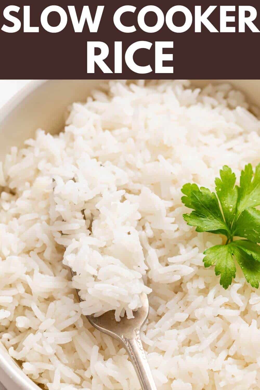 Slow cooker rice with a fork and parsley.