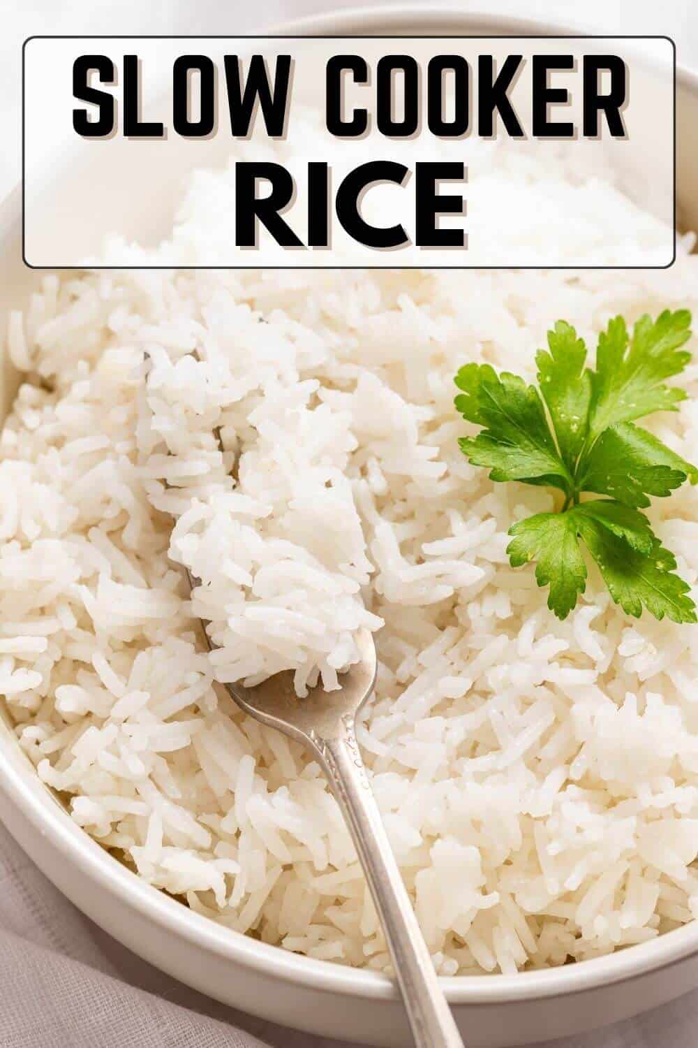 A bowl of rice with the text slow cooker rice.