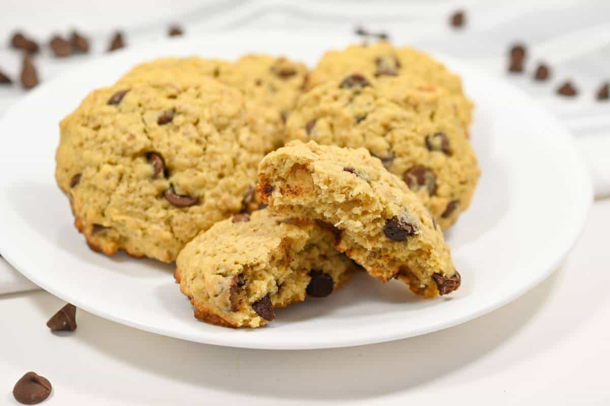 A plate of cookies on a white surface.