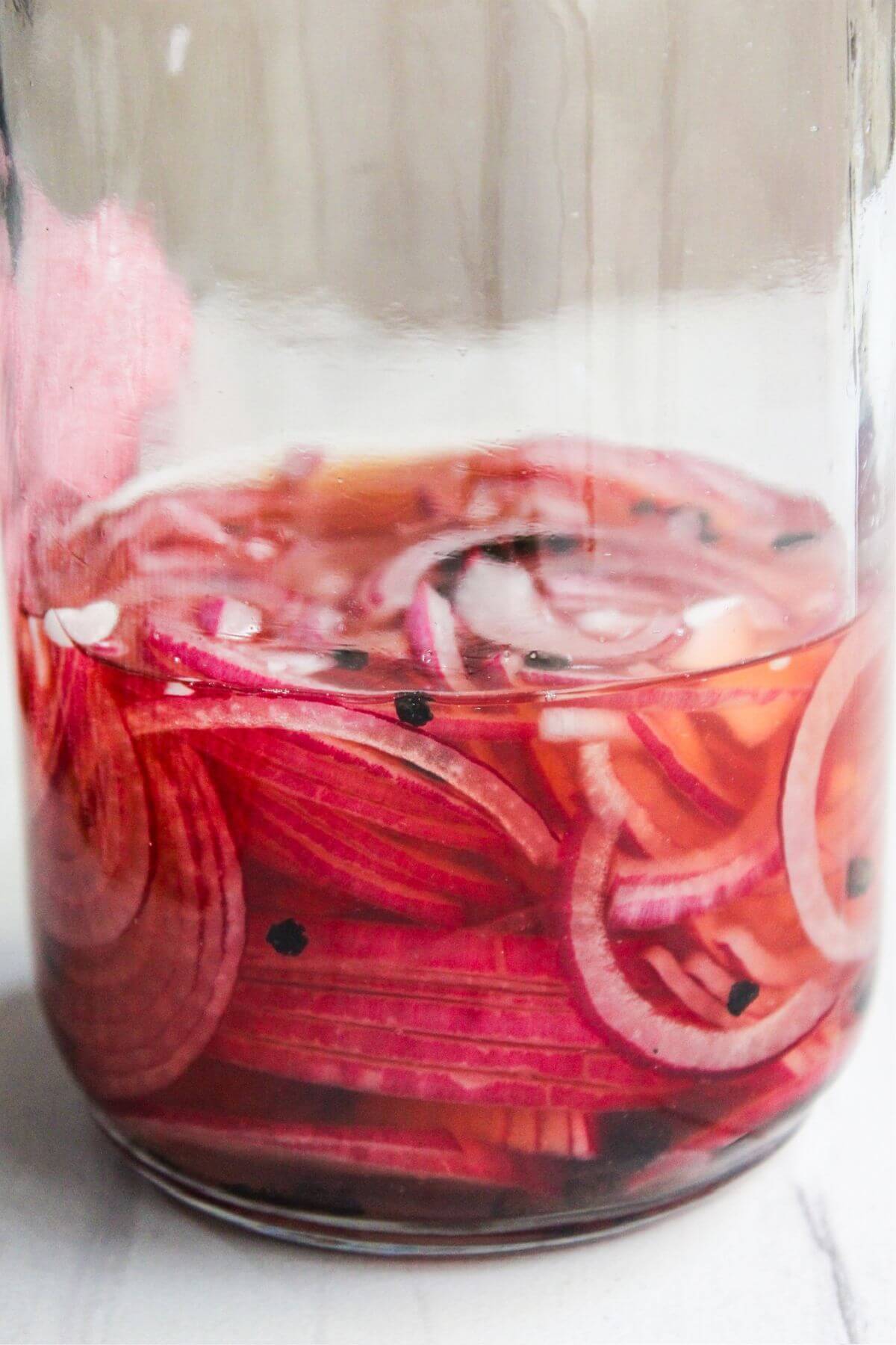 A jar of pickled onions.