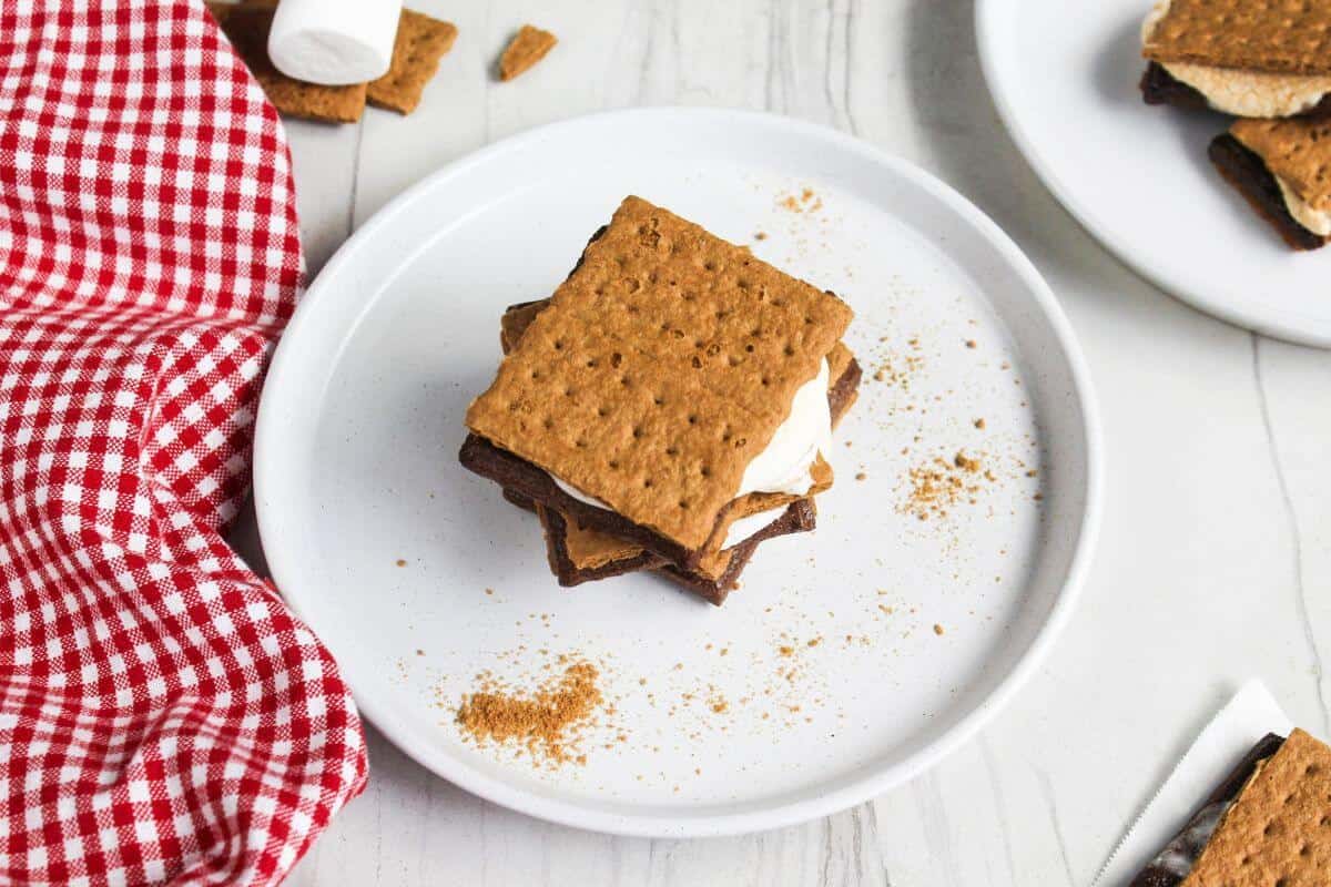 A stack of s'mores on a plate.