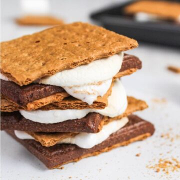 A stack of chocolate s'mores stacked on top of each other.