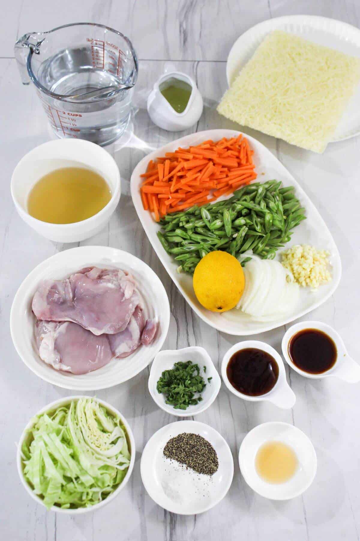 Ingredients for Filipino chicken pancit bihon.