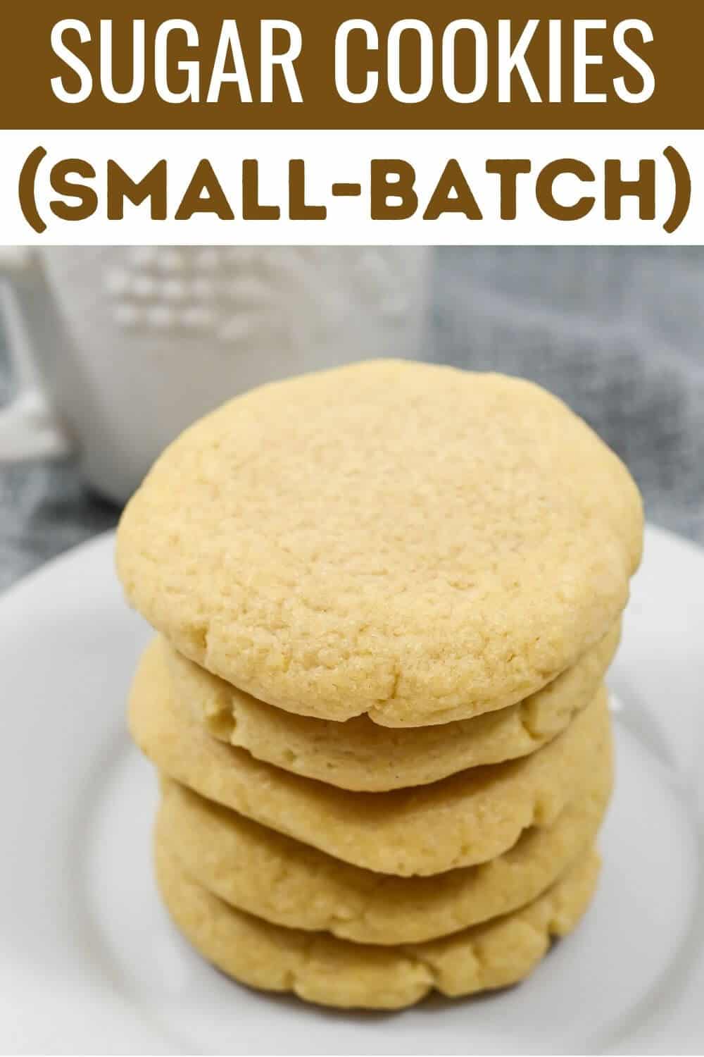Stack of homemade sugar cookies with text overlay "sugar cookies (small-batch).