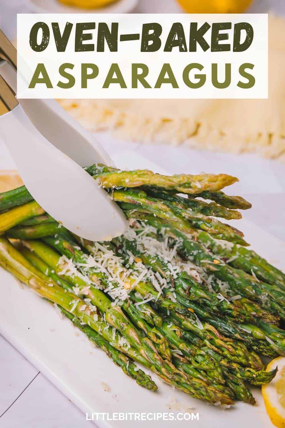 Tongs hold oven-baked asparagus topped with grated cheese on a white plate. A website URL is visible at the bottom.