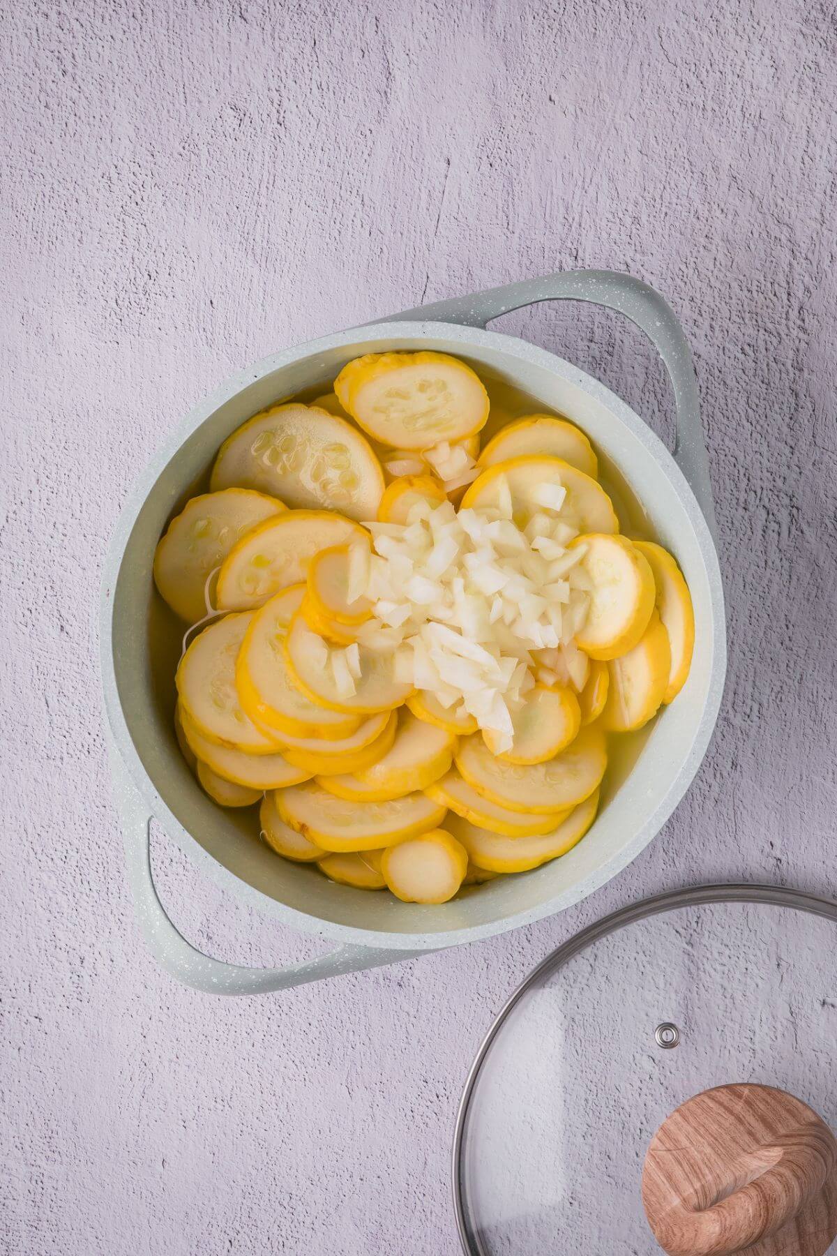 Squash, onion, broth, and avocado oil in a medium pot
