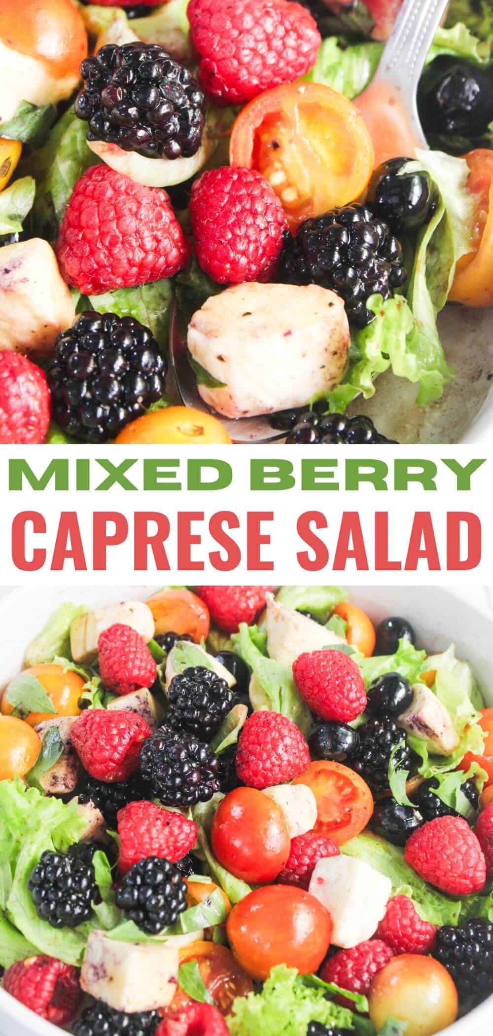 A bowl of mixed berry Caprese salad with lettuce, cherry tomatoes, blackberries, raspberries, mozzarella cubes, and a spoon.